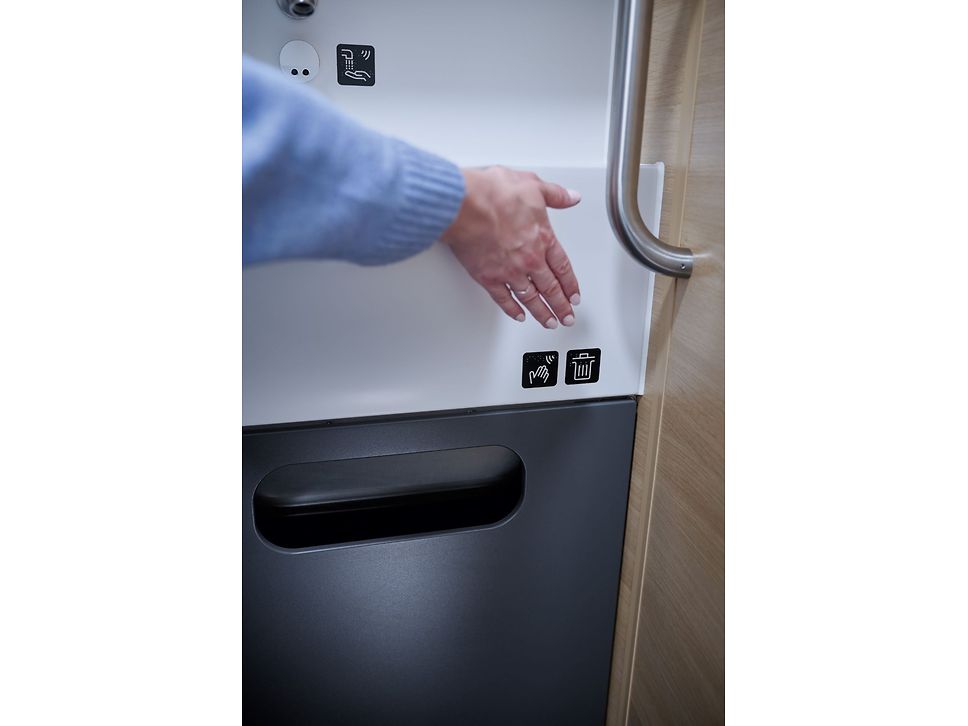 Öffnung des Abfallbehälterklappe im WC ohne Berührung möglich
